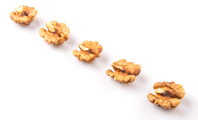 Walnut nuts over white background