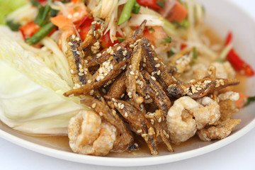 fish fried with papaya spicy salad
