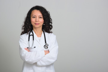 Asian female doctor with stethoscope - Powered by Adobe