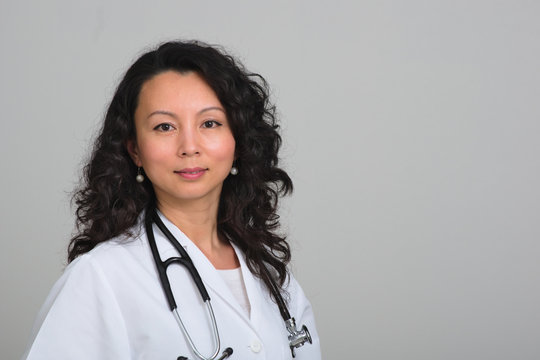 Asian Female Doctor With Stethoscope