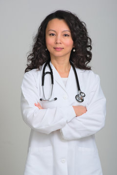 Asian female doctor with stethoscope