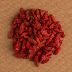 Circle of dry red goji berries
