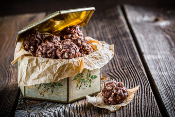 Sweet chocolate balls with corn flakes and milk