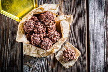 Sweet cocoa balls with corn flakes and milk