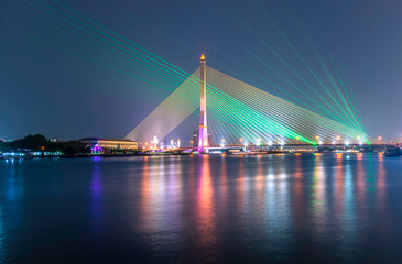 Fototapeta na wymiar laser show at Bridge Rama8