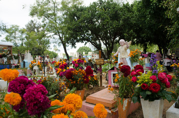 Typical, colorful mexican cemetery decorated for all saints day