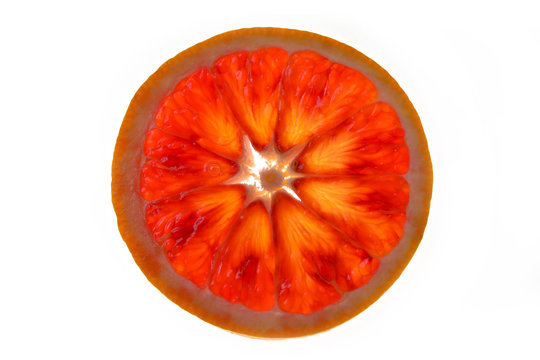Red blood slice of orange, cut in round shape, very juicy