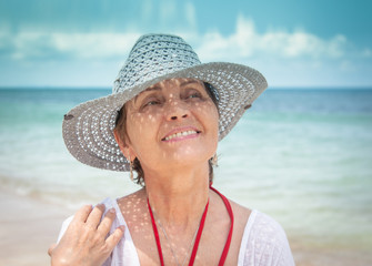 portrait of a beautiful middle-aged woman on the background of t