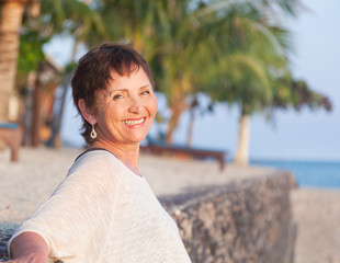 portrait of a beautiful middle-aged woman on the beach
