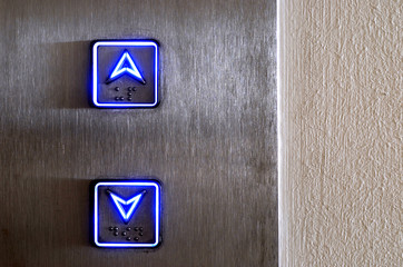 Neon elevator controls showing up and down © david_franklin