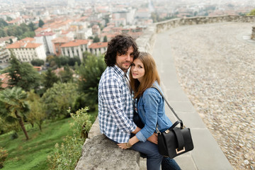 Fototapeta premium Beautiful couple enjoying themselves in the Italian streets