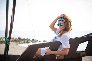 girl in sunglasses. Warm sunny day. Outdoors