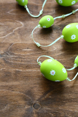 Easter garland on wooden surface