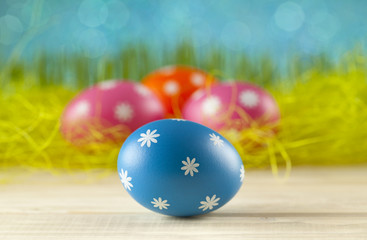 Colored Easter eggs on blue background