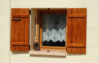 Opened wooden window shutters