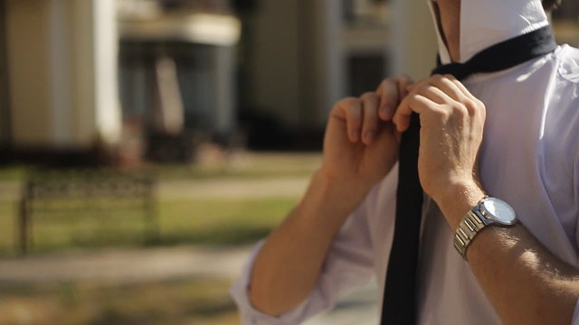 the guy on the street to tie a tie