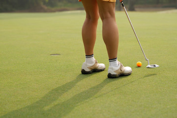 Hitting the ball with a putter
