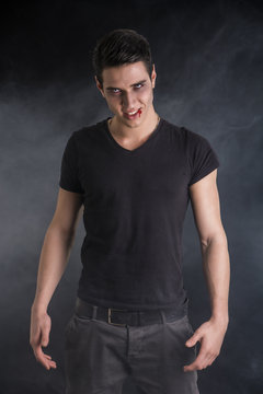 Portrait of a Young Vampire Man with Black T-Shirt