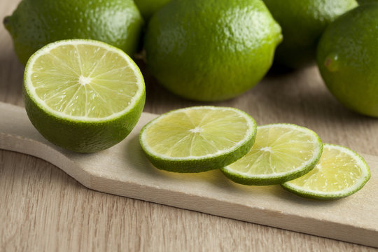 Fresh green limes slices