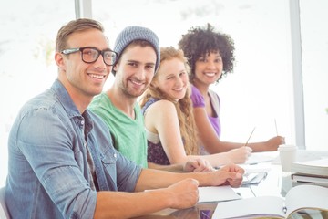 Fashion students smiling at camera