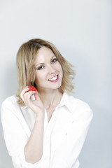 Woman eating fresh strawberries