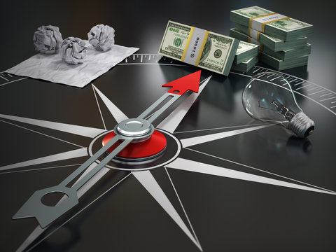 Conceptual image of compass directing at money. Course concept.