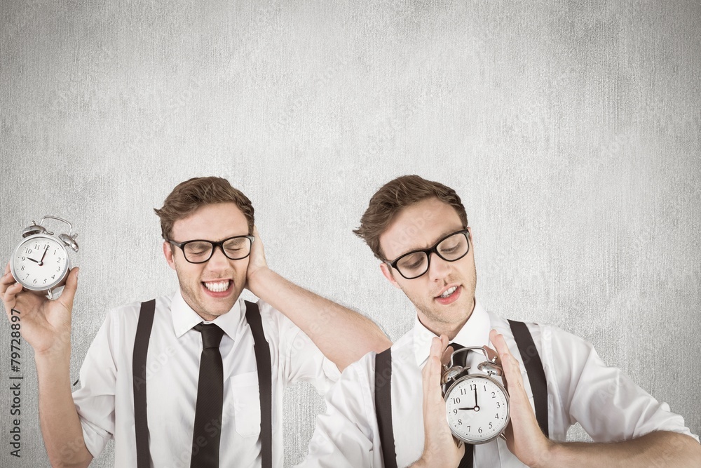 Poster Composite image of nerdy businessman with alarm clock