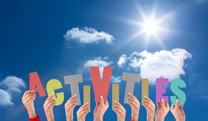 Composite image of hands holding up activities