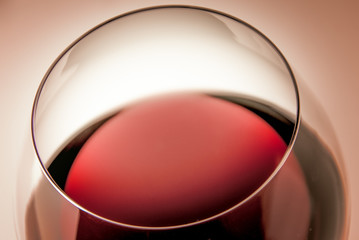 A glass of sophisticated sicilian Marsala vine on graduated homogenic background,in the color of the year 2015, Marsala 18-1438 toned photo