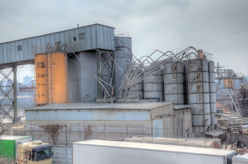 Obraz premium Cement factory production site and storage yard