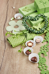 Green spring arrangement with chocolate pralines