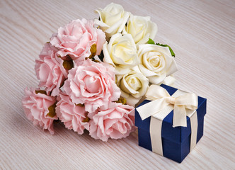 roses and blue gift box
