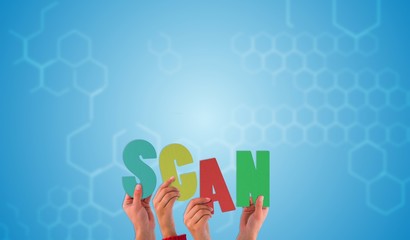Composite image of hands holding up scan