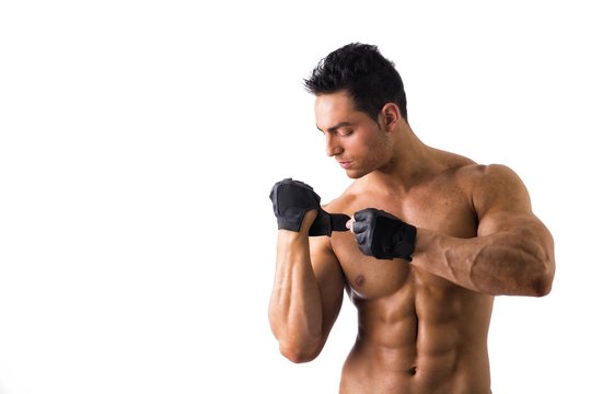 Topless Muscled Man Wearing Gloves for Workout