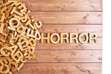 Word horror made with wooden letters