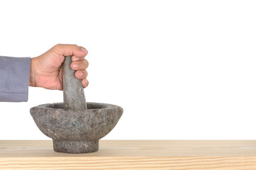 hand business man catch pestle mortar on pine isolated on white