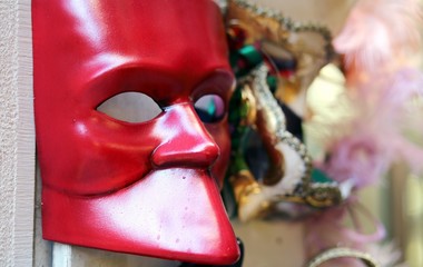 Red mask for sale in calle of Venice