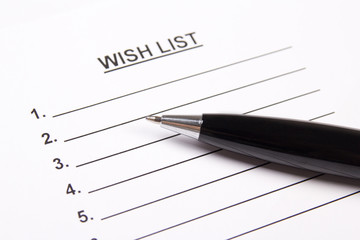 close up of blank wish list and pen