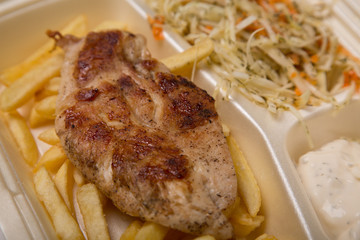 Grilled chicken meat, and French fries