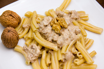Pasta with walnut pesto close up view