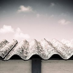 Dangerous asbestos roof - Toned image with copy space