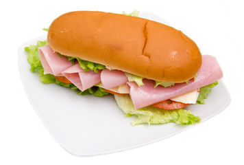 Sandwich with ham and salad on white background