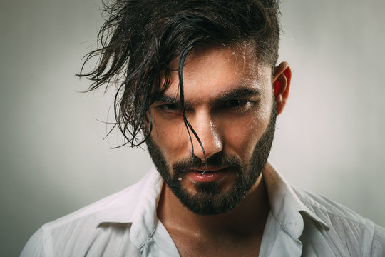 Portrait Of A Man With A Beard And Wet Face