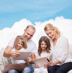 happy family with tablet pc computers