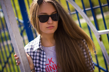 portrait of a cute girl on the sports ground