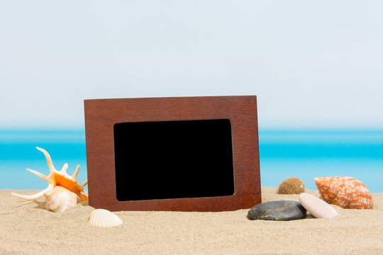 Pictures frame on the beach
