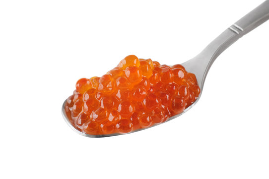 Red caviar on the silver spoon.