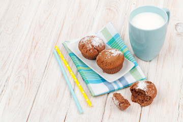 Cup of milk and cakes