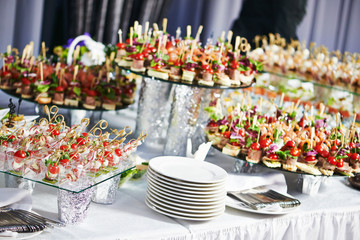 catering service table with food set