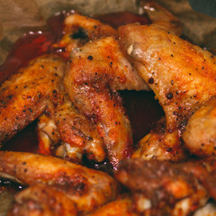 fried chicken wings in focus
